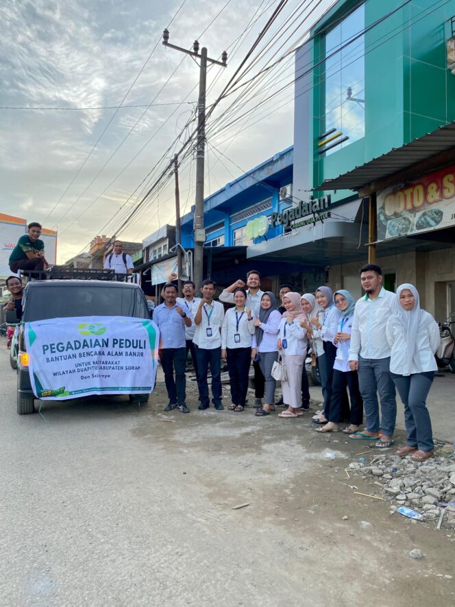 
 PT. Pegadaian Cabang Duapitue Salurkan Bantuan Kewarga yang Terdampak Banjir