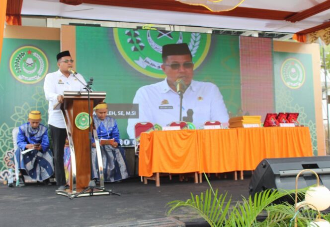 
 Pj Sekda Sidrap, Andi Rahmat Saleh saat menghadiri Khataman Shorof dan Tahfidz 30 Juz di Ponpes Al Wahid, Desa Wanio, Sidrap,  Rabu (30/4/2025).